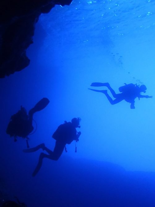 divers in blue cave crete