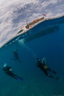 Boat Divers underwater